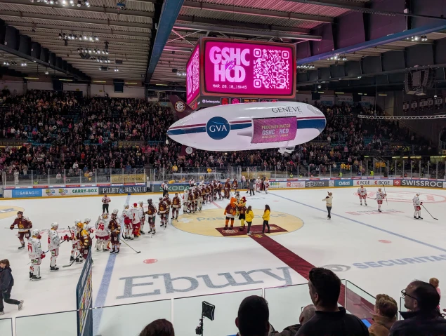 A blimp flying indoors at an event, demonstrating indoor blimp advertising.